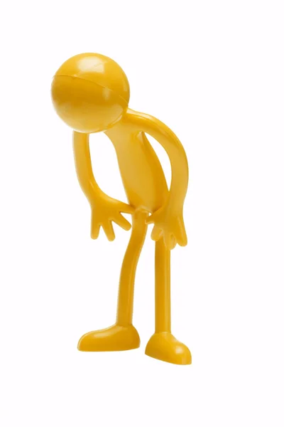 Bowing rubber toy figurine — Stock Photo, Image