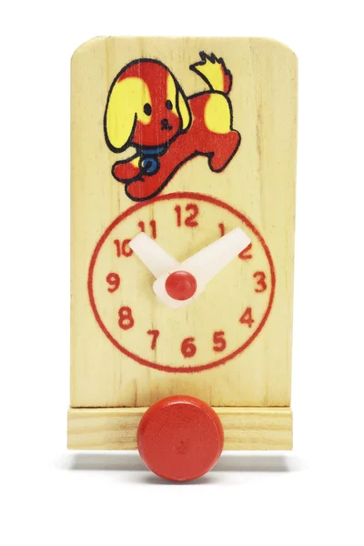 Toy wooden adjustable clock on wheels — Stock Photo, Image