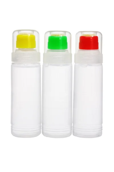 Plastic bottles of liquid glue — Stock Photo, Image