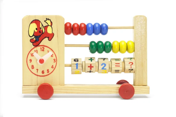 Toy abacus and clock on wheels — Stock Photo, Image