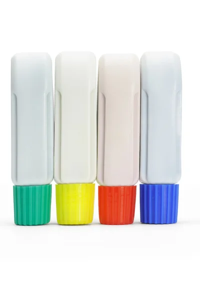 Quatro tubos de tintas coloridas — Fotografia de Stock