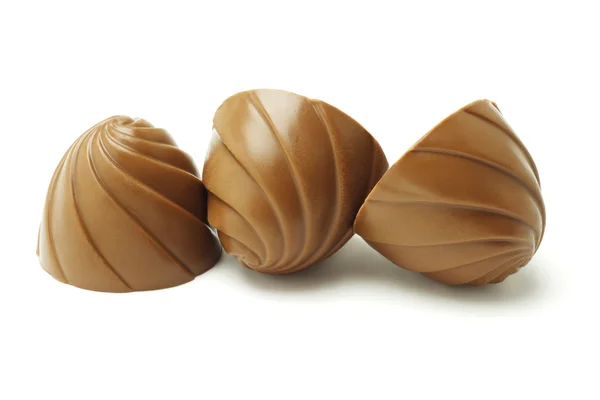 Τρεις καραμέλες από σοκολάτα σε μια σειρά — Φωτογραφία Αρχείου