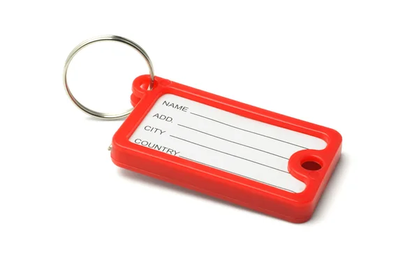 Etiqueta chave de plástico vermelho — Fotografia de Stock