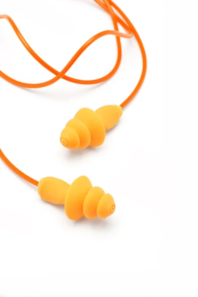 Plugues de ouvido laranja — Fotografia de Stock