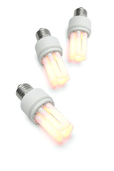 Lâmpadas fluorescentes compactas quentes brilhantes — Fotografia de Stock