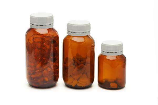 Tres frascos de vidrio de medicamentos —  Fotos de Stock