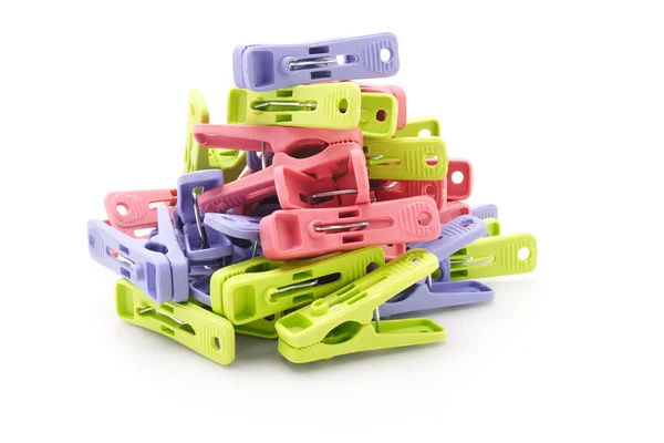 Pile of colorful plastic pegs — Stock Photo, Image