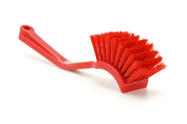 Cepillo plástico doméstico rojo —  Fotos de Stock