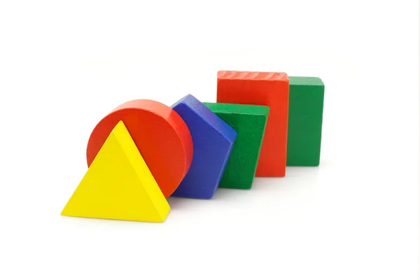 Colorful wooden geometric blocks — Stock Photo, Image