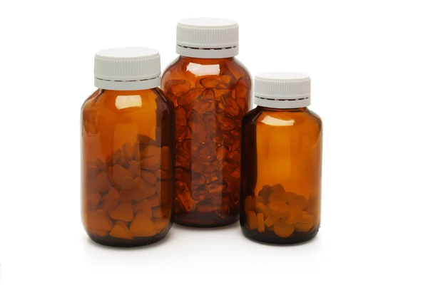 Three bottles of health supplements — Stock Photo, Image