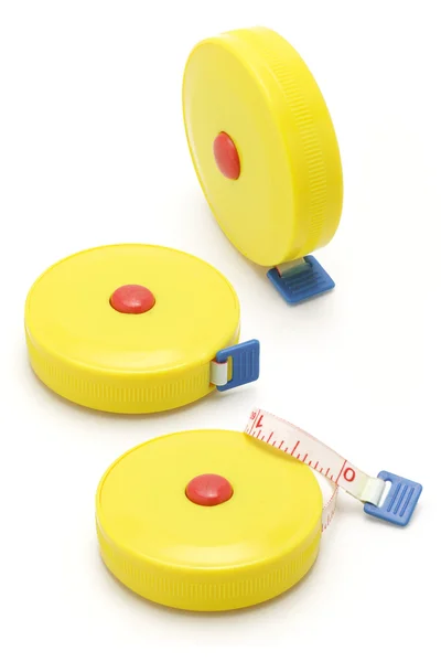 3 つの黄色の測定テープ — ストック写真