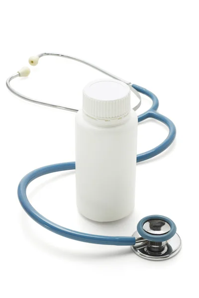 stock image Stethoscope and bottle of medicine