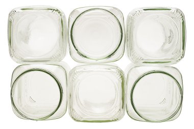 Stack of empty glass containers clipart