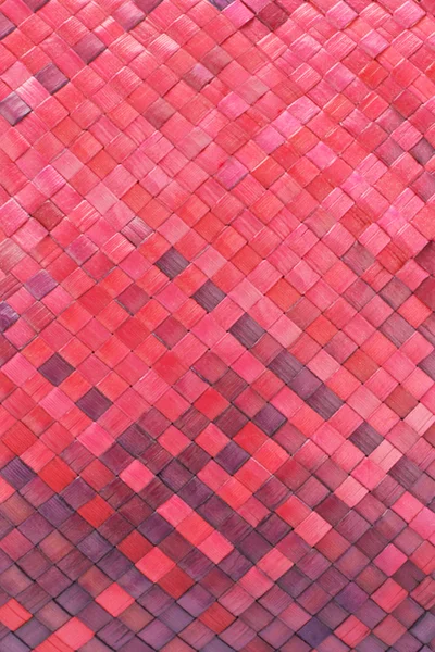 stock image Red woven palm leaves mat