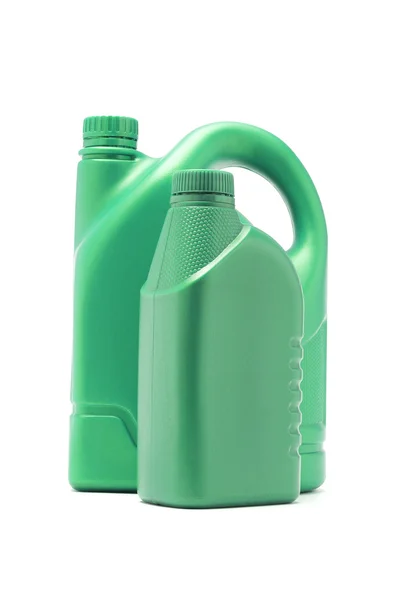 Récipients en plastique vert pour huile moteur — Photo