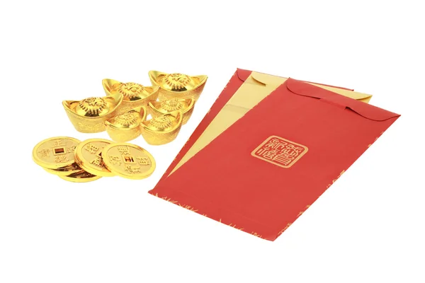 Chinese new year red packets and gold ingots — Stock Photo, Image