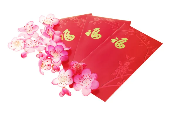 Szilva virágok és piros csomag — Stock Fotó