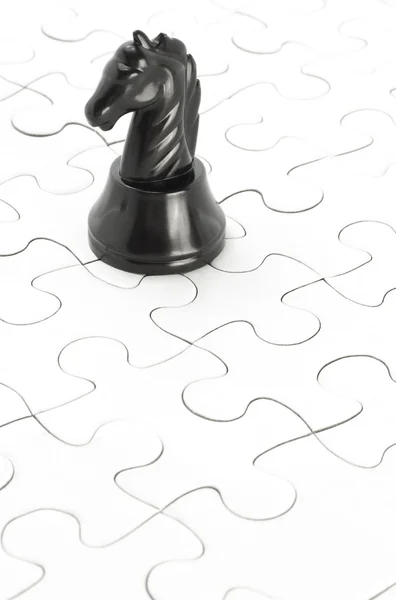 Černý rytíř a puzzle — Stock fotografie