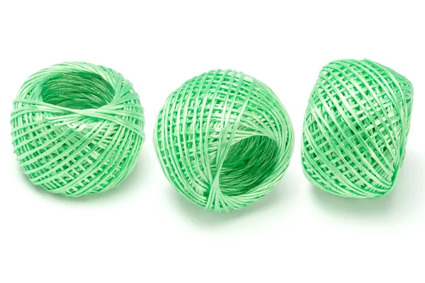 Três bolas de corda de nylon verde — Fotografia de Stock