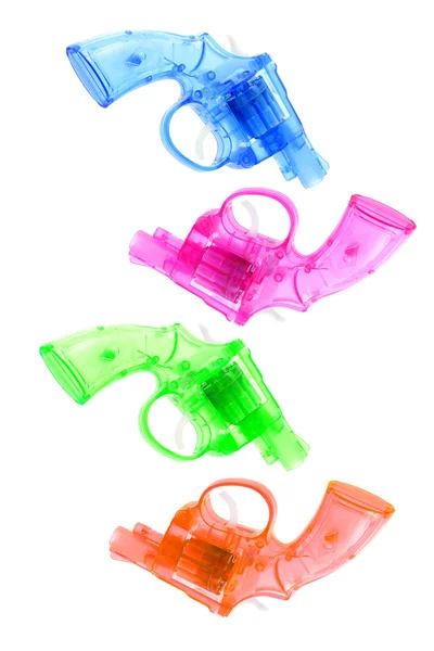 Kolorowe plastikowe zabawki w kształcie broni — Zdjęcie stockowe