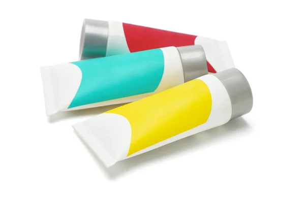 Tres tubos cosméticos — Foto de Stock