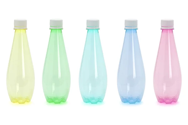 Cinco garrafas plásticas coloridas — Fotografia de Stock