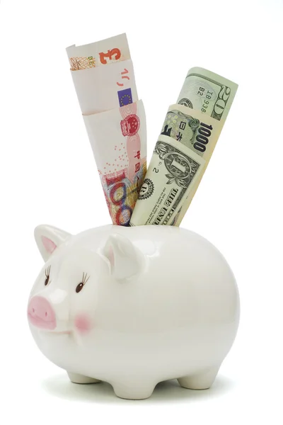 Piggy bank and major world currencies — Stock Photo, Image
