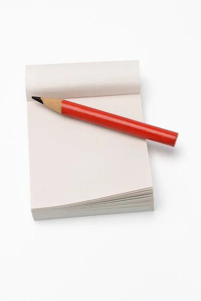 Lápis curto e mini bloco de notas — Fotografia de Stock