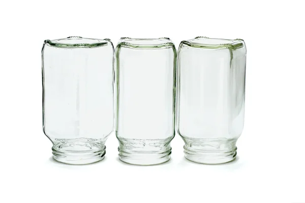 Três garrafas de vidro invertido — Fotografia de Stock