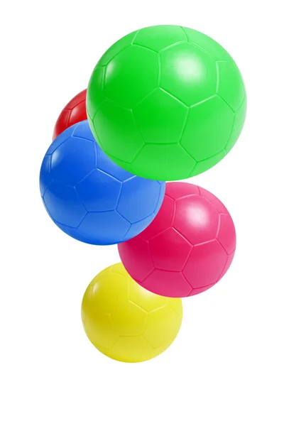 Барвисті пластикові футбольні м'ячі — стокове фото