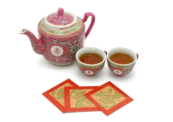 中国長寿お茶セットと赤のパケット — ストック写真