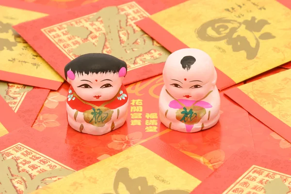 Traditional Chinese boy and girl figurines — Stock Photo, Image