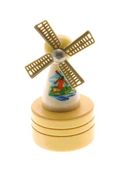 Lembrança de moinho de vento de madeira em miniatura no fundo branco — Fotografia de Stock