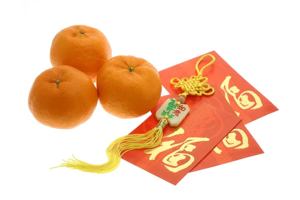 Čínský Nový rok ornament, pomeranče a červená pakety — Stock fotografie