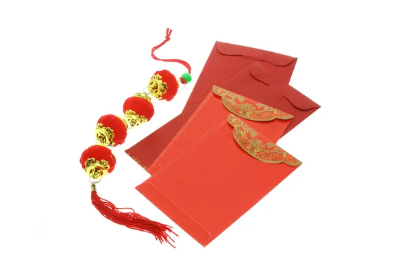 Chinese New Year red packets and lanterns — Stock Photo, Image