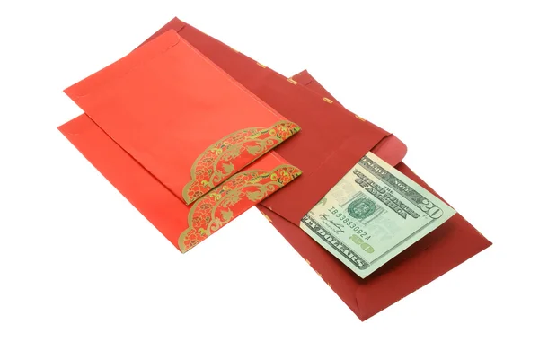 Paquetes rojos del Año Nuevo Chino y dólares americanos — Foto de Stock