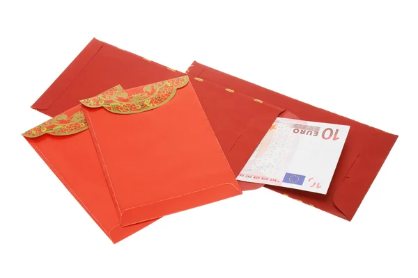 Chiński Nowy rok czerwony pakietów i banknotów euro — Zdjęcie stockowe