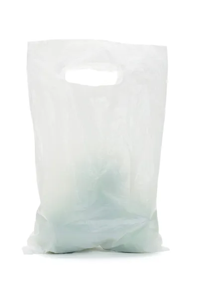 Fehér átlátszó műanyag zacskót, zöld almával — Stock Fotó