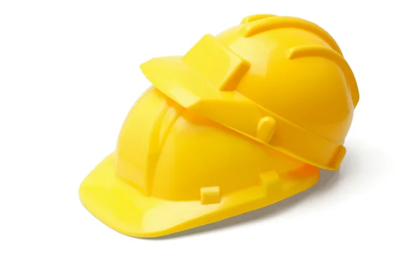Желтые защитные шлемы — стоковое фото