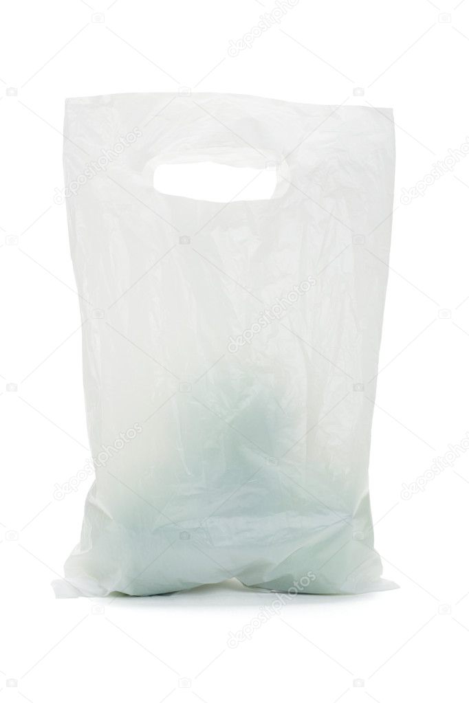 White opaque plastic bag with green apples