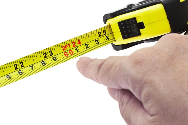 Finger pointing on measuring tape — Stock Photo, Image