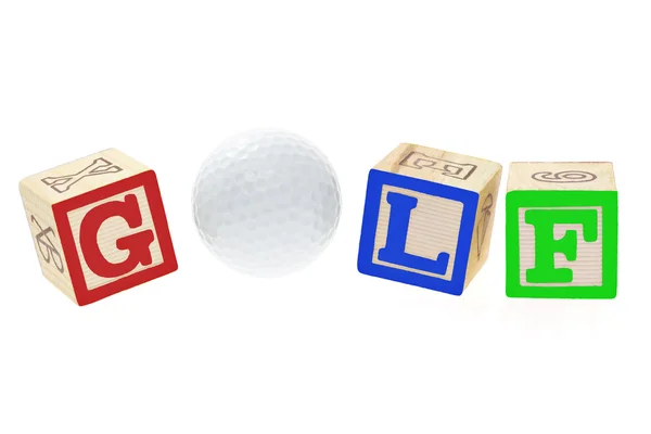 Гольф мяч и алфавитные блоки — стоковое фото