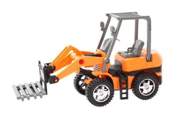 Plastová hračka traktor — Stock fotografie