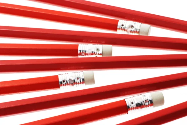 Czerwony pisania ołówki tło — Zdjęcie stockowe