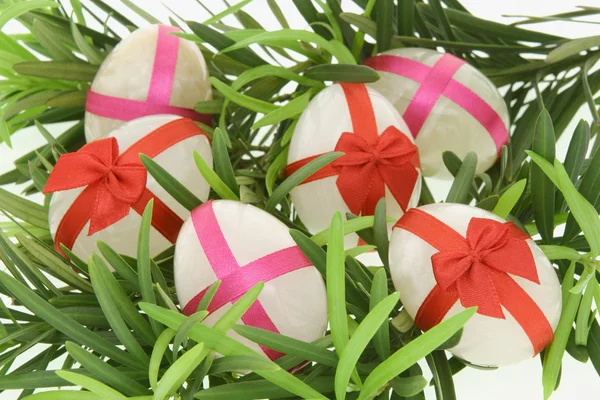 Decorated egg shaped stones for Easter — Stock Photo, Image