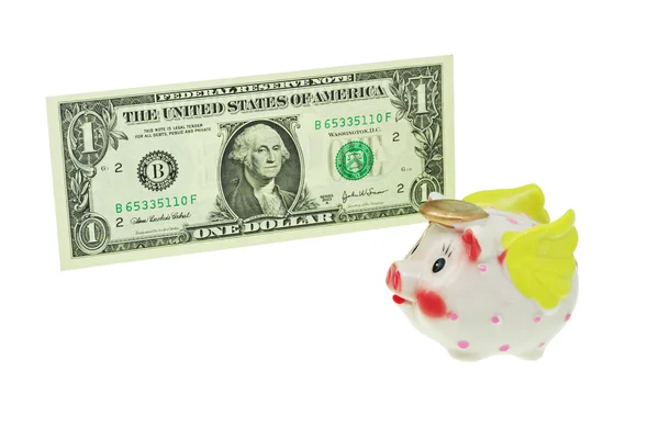 Banco porquinho voador passando uma nota de dólar — Fotografia de Stock