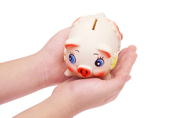 Piggy bank in de Palm van de hand van het kind — Stockfoto