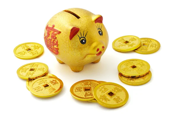 Banco piggy ouro chinês e moedas — Fotografia de Stock