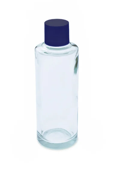 Bottiglia di vetro vuota con tappo blu — Foto Stock