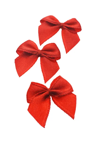 Three mini red bows — Stock Photo, Image